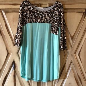 Turquoise and leopard top. Brand new never worn.